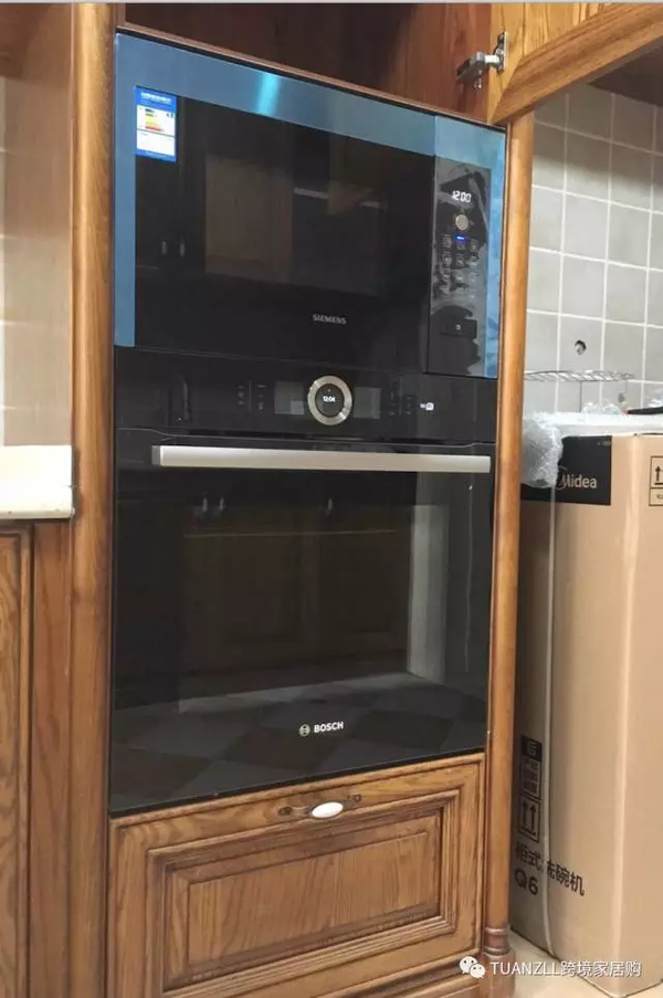 嵌入式烤箱/蒸箱,是安装在高柜中间还是操作台下面好?