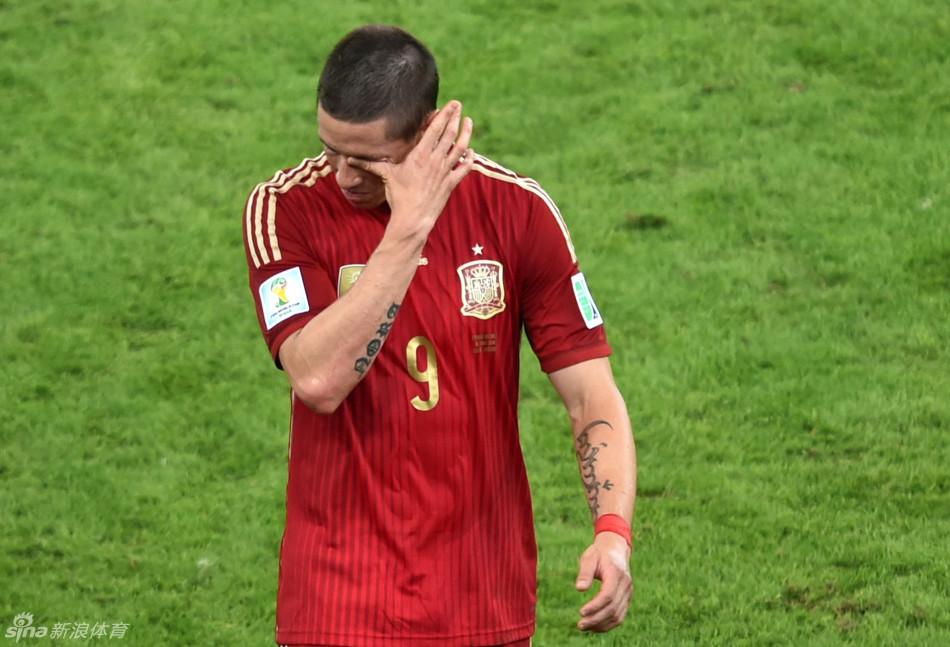 如何评价西班牙队在 2014 年巴西世界杯的表现