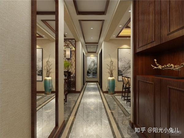 效果图: 玄关: 进门就是玄关区,入户门右面定制了玄关柜,左面是