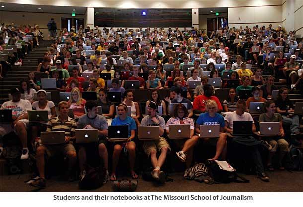 学编程的学生在 Winbook 和 MacBook 之间如