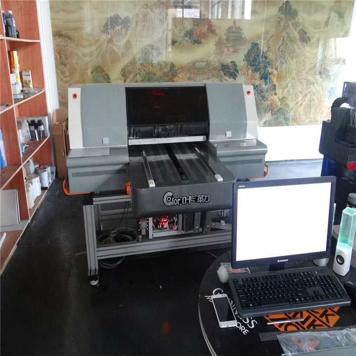 给手机后盖印照片的机器叫什么?