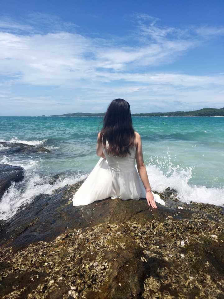 拍带有大海的人像时,海平线到底放在人哪个位置合适?