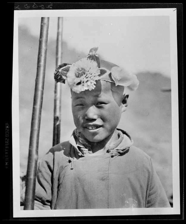 为什么一百年前的照片里的中国人很多都是苦瓜脸?