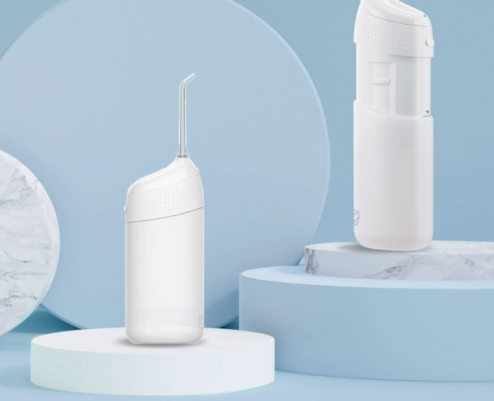 秒秒测便携式智能冲牙器——齿间洁净,一按即可