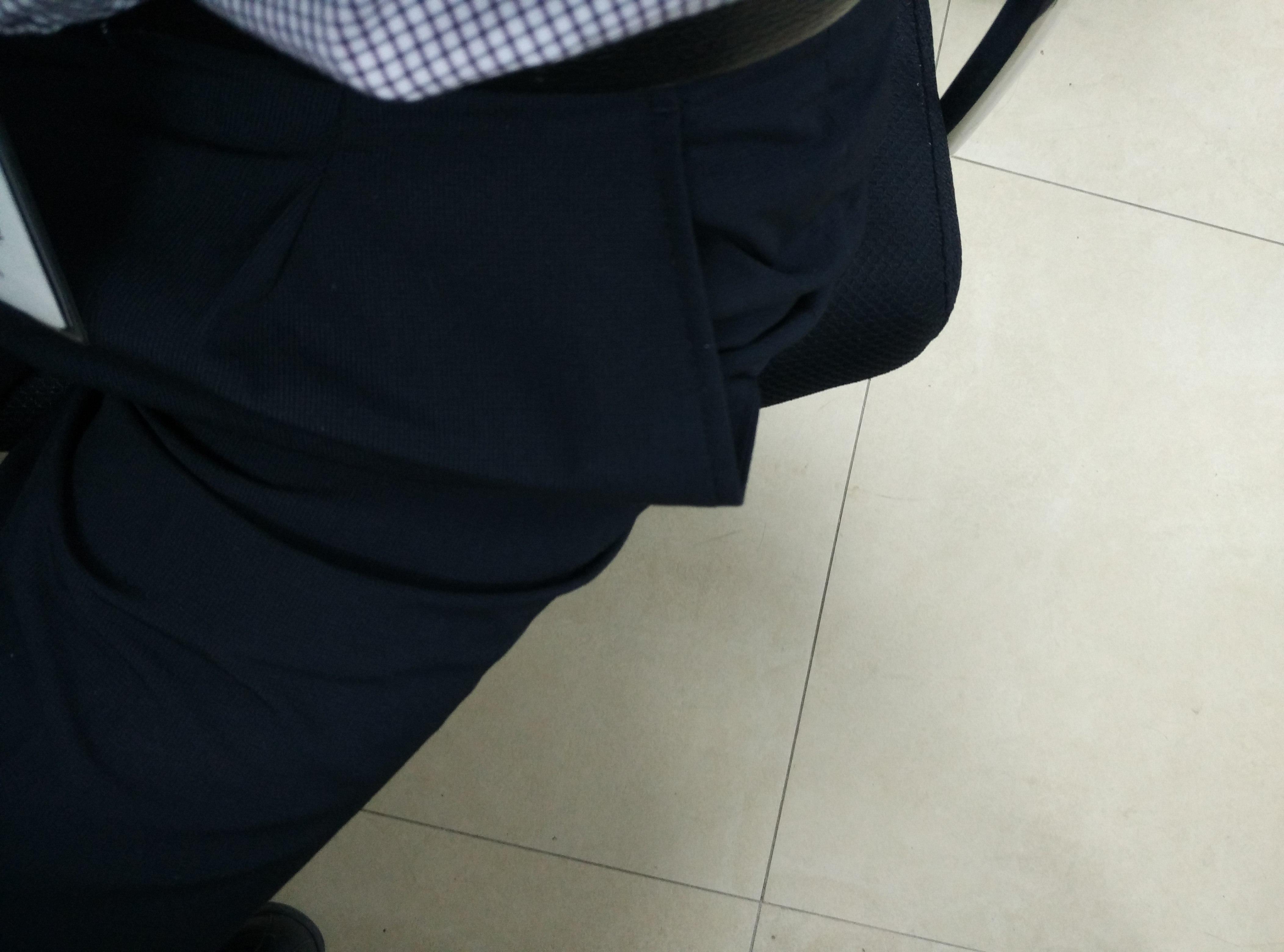 西裤口袋往外翘是什么原因?