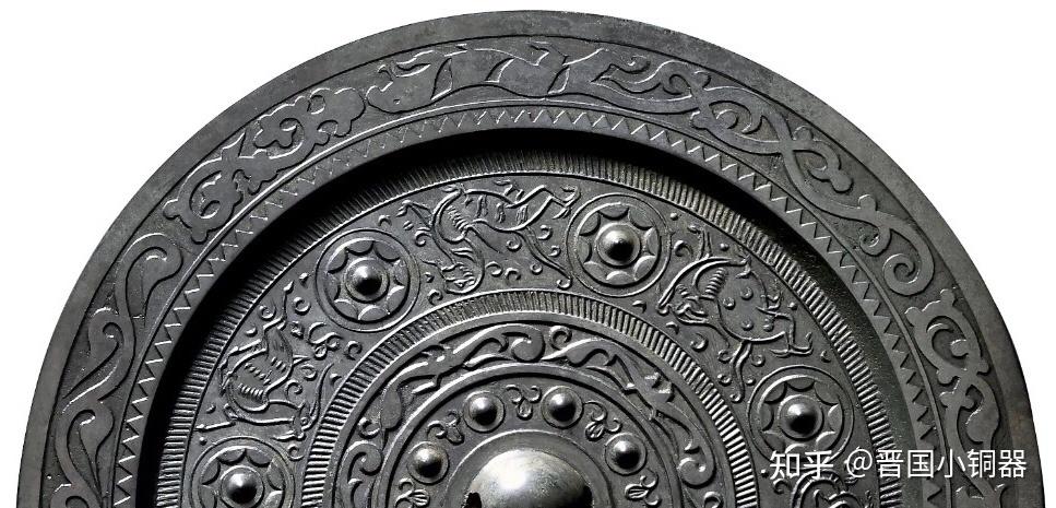 东汉动物纹边饰五凤环绕七乳瑞兽纹镜