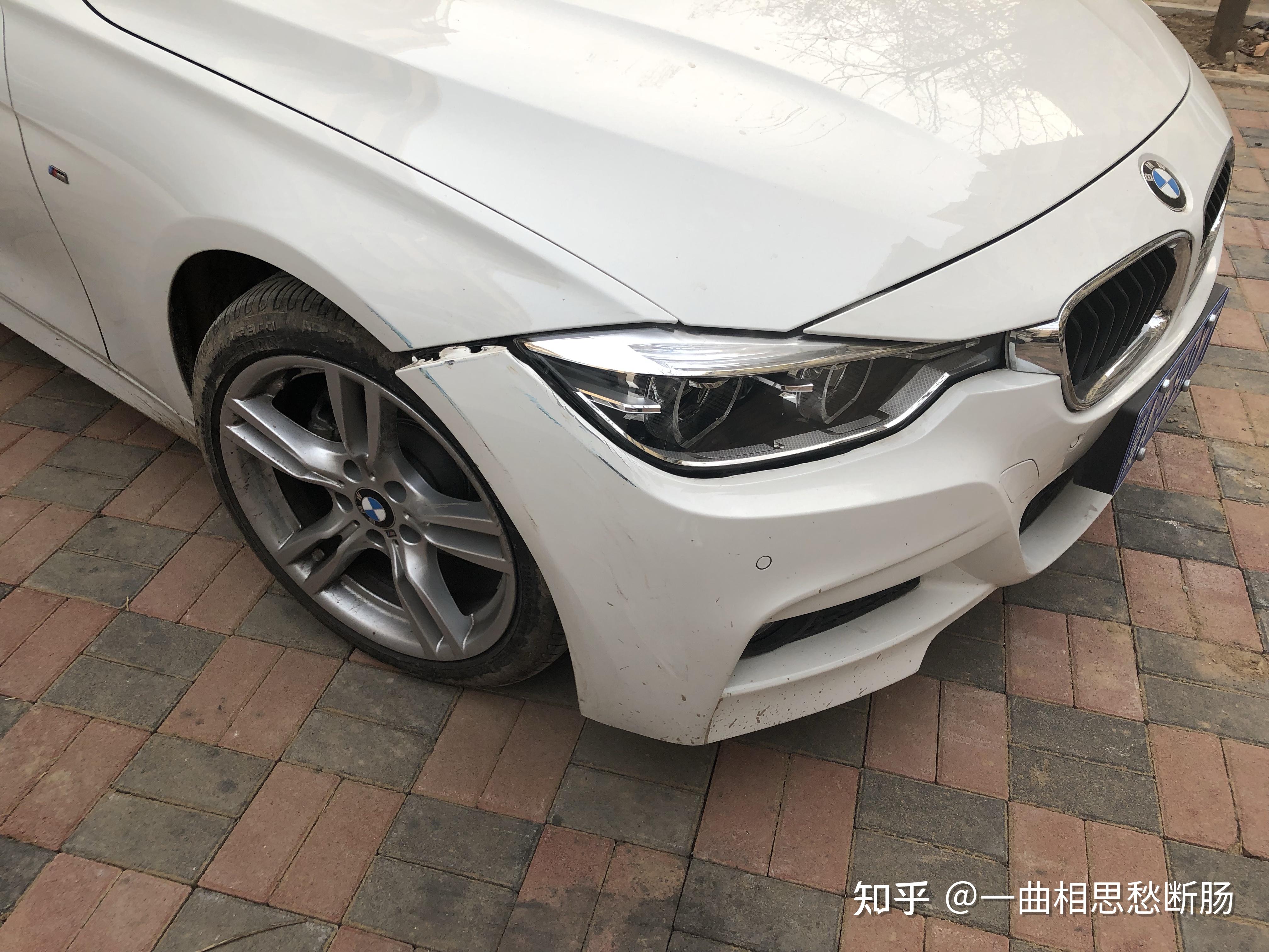 宝马3系320i运动款前保险杠蹭裂是换还是修