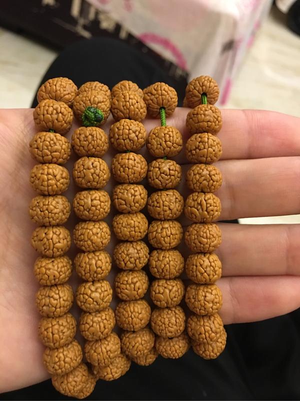 帮我看看这个龙鳞纹的小金刚好不好,是什么皮质的?