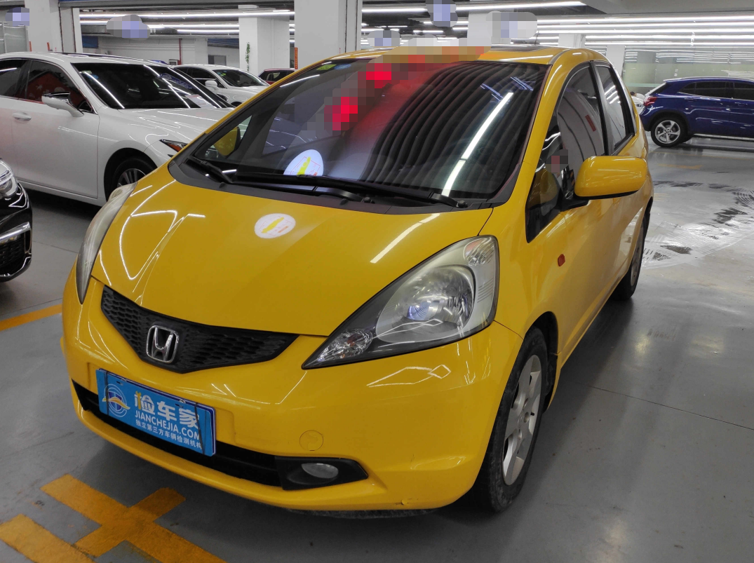 5手动豪华版的飞度,上牌日期是2009年7月,目前表显里程9.