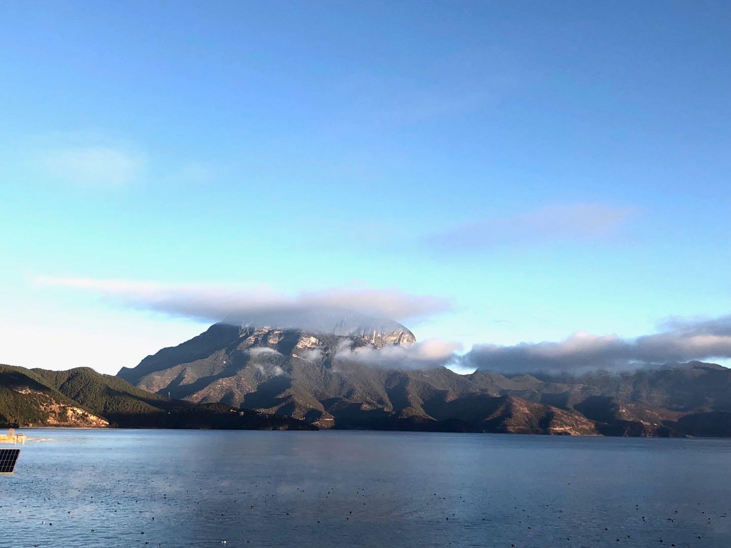 云南丽江旅游必去景点推荐格姆女神山低音号免费语音导游