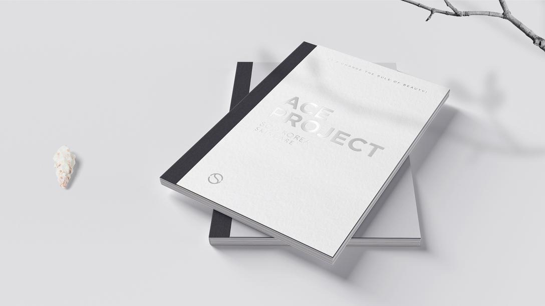 画册采用锁线裱布装帧方式,封面裱2mm荷兰板,烫银文字与图形画册设计