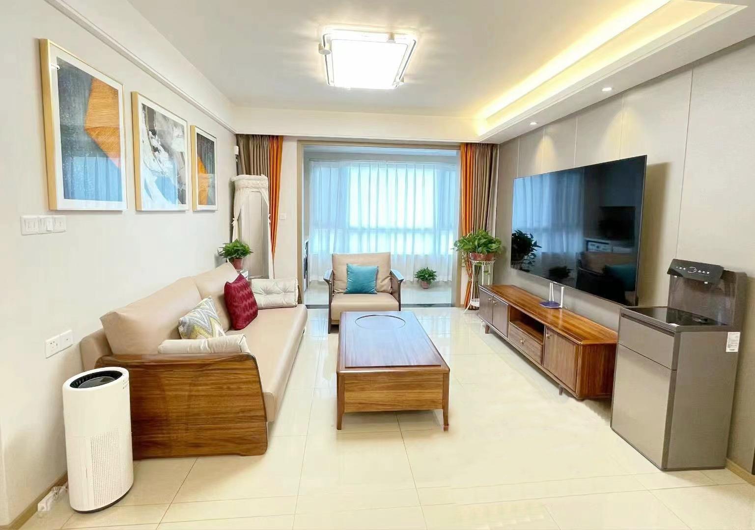 一统国际家居样板间原木风三居室温润配色糅合木质家具享舒适闲逸之感