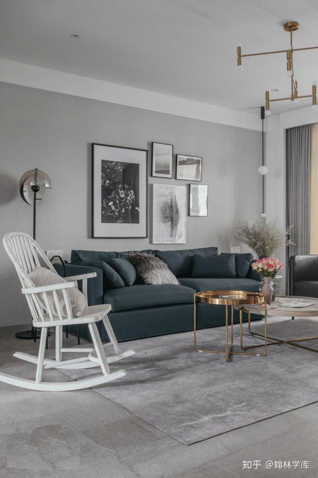 灰色调的地砖加上灰色调的沙发背景墙和沙发,搭配大理石元素的电视
