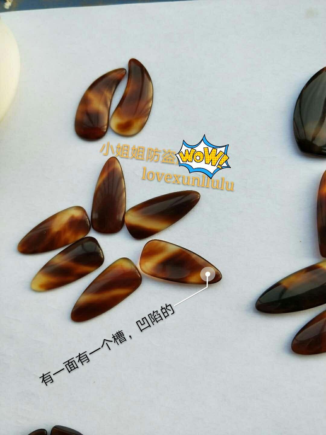 撇开个人习惯问题,古筝指甲中,凹槽、单面弧、