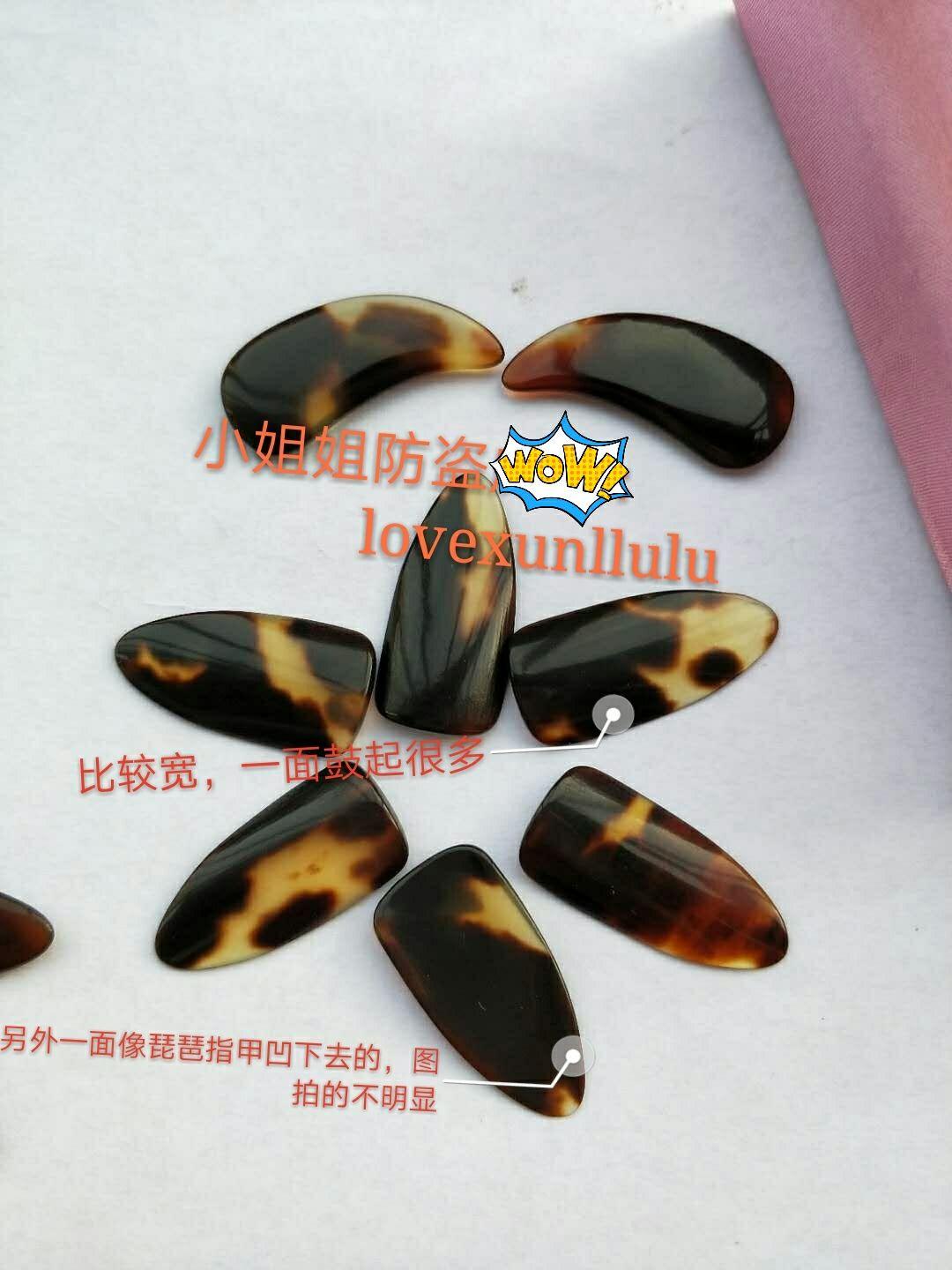 撇开个人习惯问题,古筝指甲中,凹槽、单面弧、