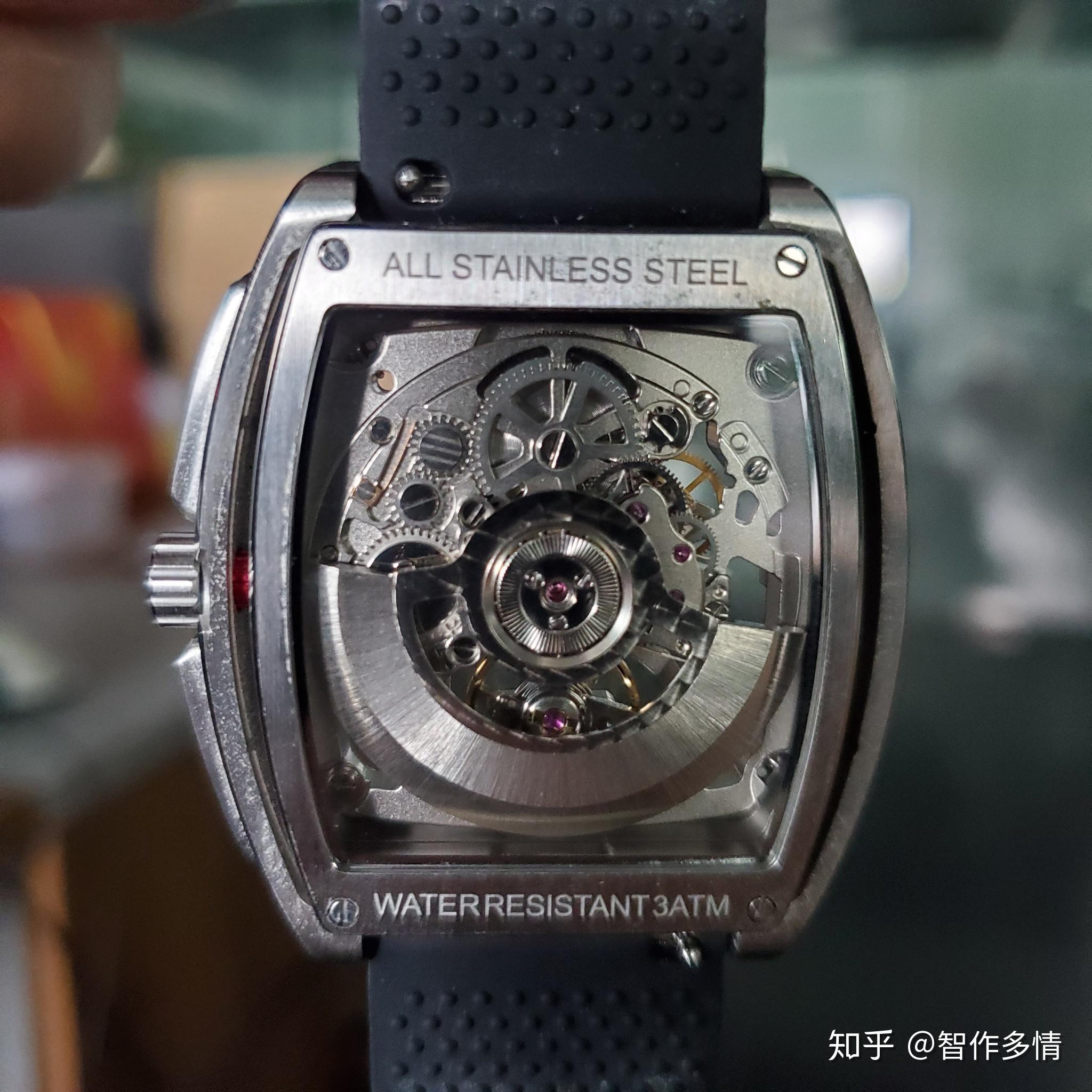 自动机械表后面上弦的摆锤为什么不是水平的