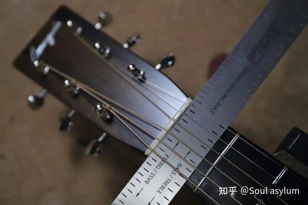 决定吉他的手感的