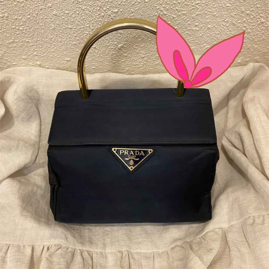 prada中古贵气的金环手提包